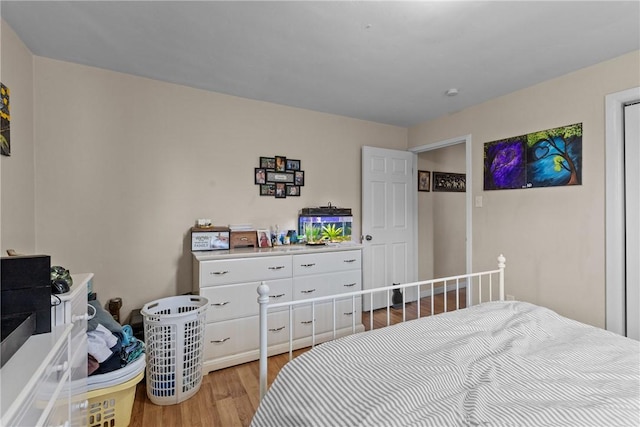 bedroom featuring light wood-type flooring