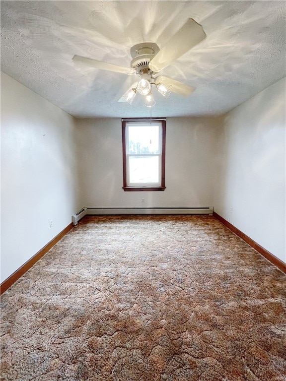 spare room with a textured ceiling, carpet flooring, ceiling fan, and baseboard heating