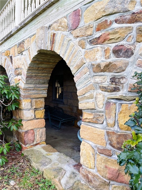 exterior details with a fireplace