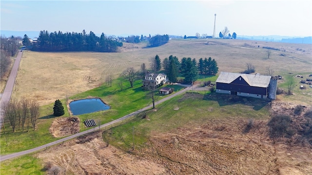 birds eye view of property featuring a rural view