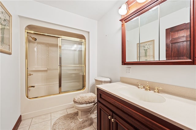 full bathroom with tile patterned flooring, toilet, vanity, and enclosed tub / shower combo