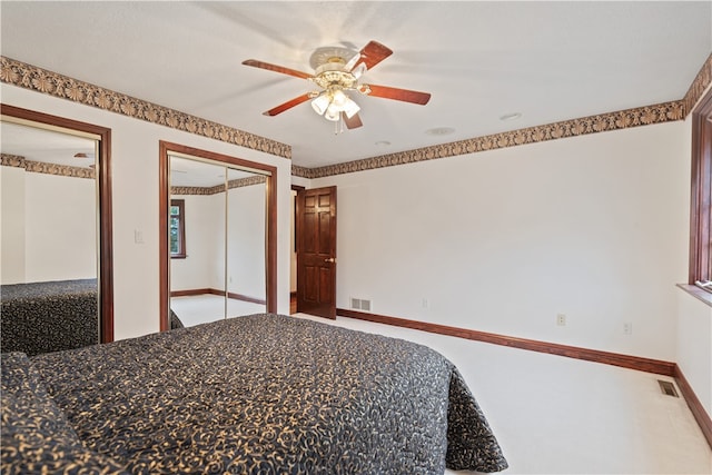 unfurnished bedroom featuring ceiling fan