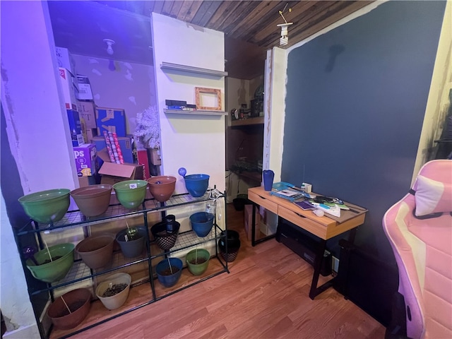 office featuring hardwood / wood-style flooring and wooden ceiling