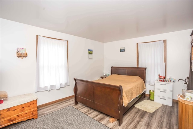 bedroom with light wood-type flooring