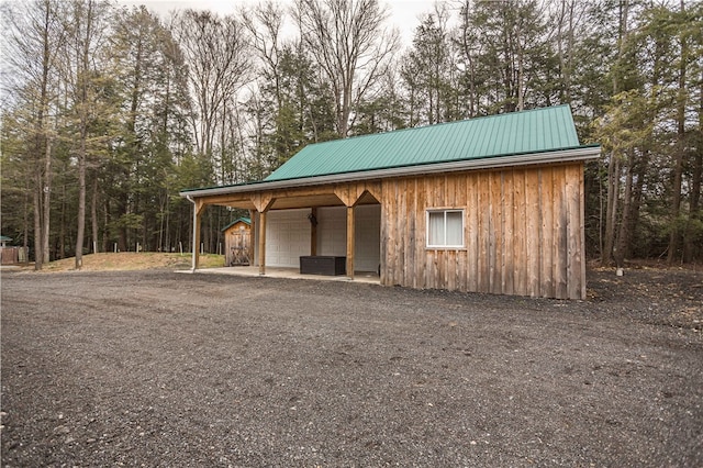 exterior space featuring a carport and central AC unit