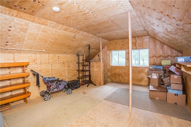 additional living space featuring lofted ceiling