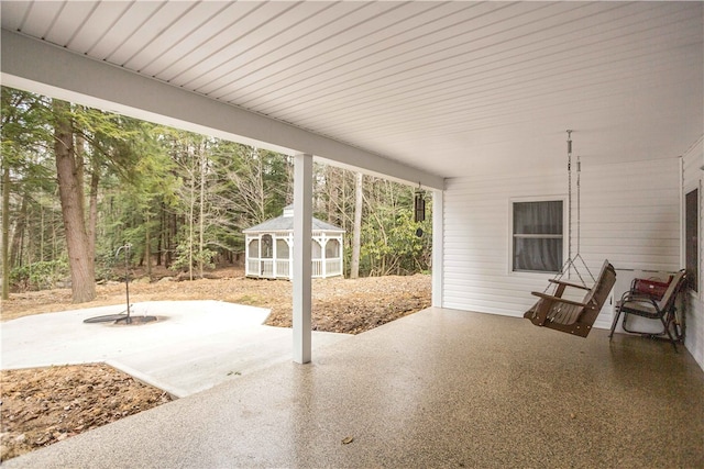 view of patio with an outdoor structure