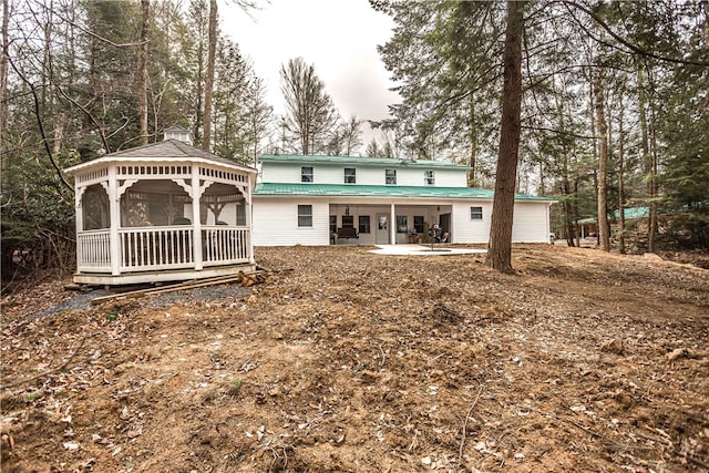 back of property with a patio area