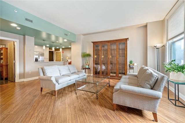 living room with light wood-type flooring