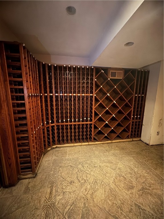 wine cellar featuring light tile floors