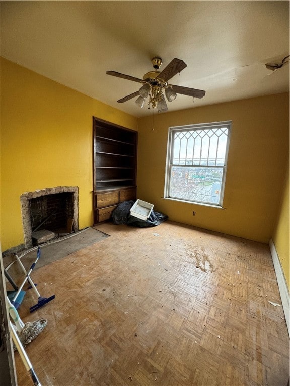 unfurnished bedroom featuring ceiling fan