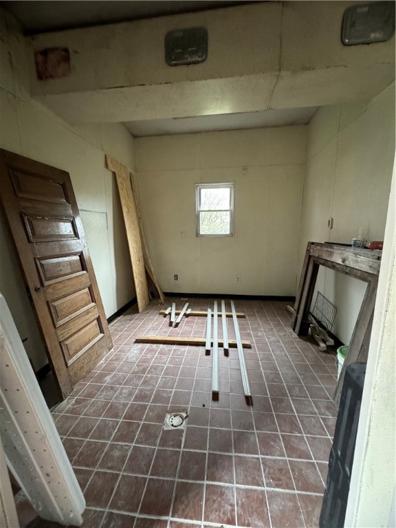 miscellaneous room with tile floors