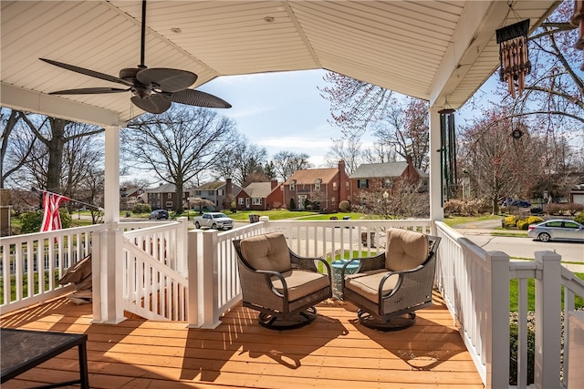 wooden terrace with ceiling fan