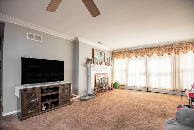 carpeted living room featuring ornamental molding, a baseboard heating unit, ceiling fan, and a brick fireplace