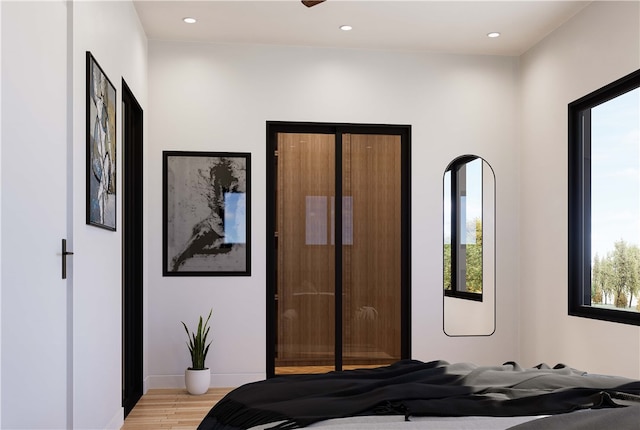 bedroom with light wood-type flooring