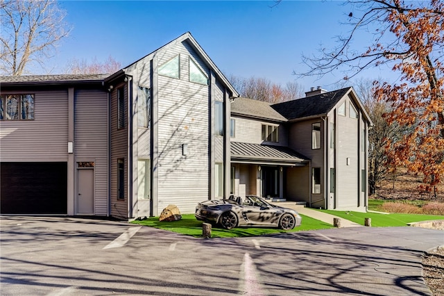 exterior space featuring a garage