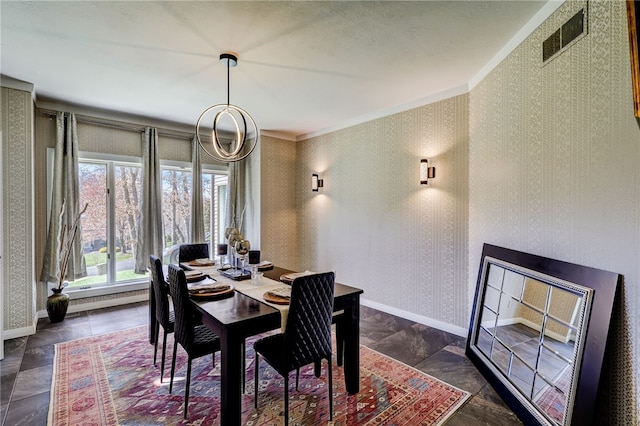 tiled dining room featuring crown molding and a notable chandelier