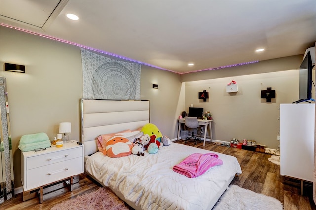 bedroom featuring dark wood-type flooring