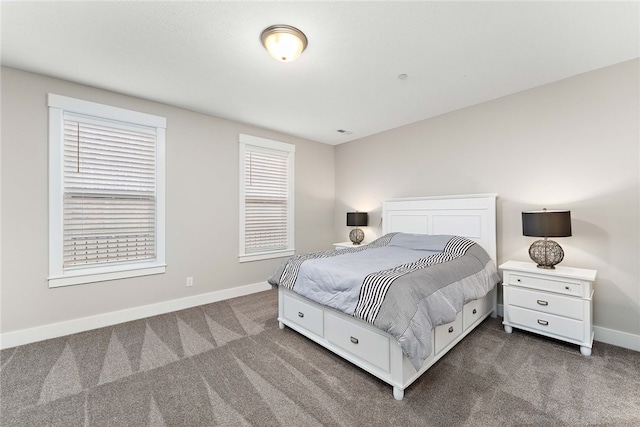 bedroom with dark carpet