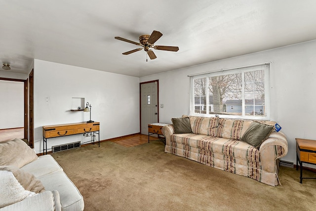 living room featuring ceiling fan and light carpet