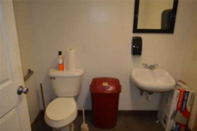 bathroom with sink and toilet