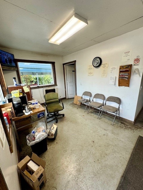 miscellaneous room with concrete flooring