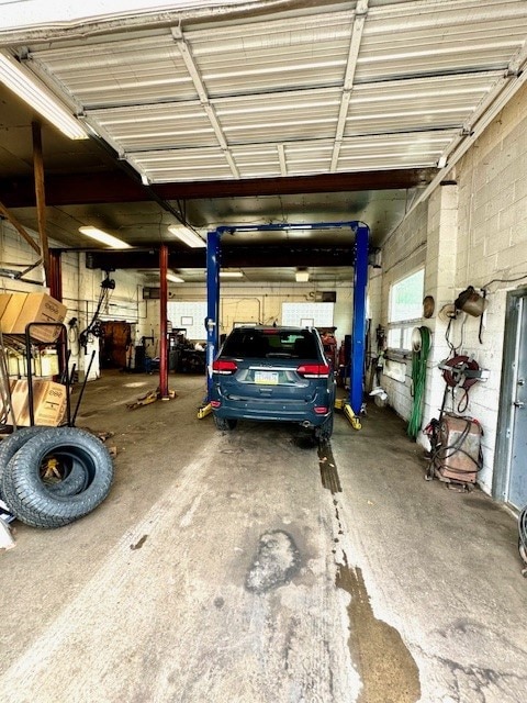 garage featuring a carport