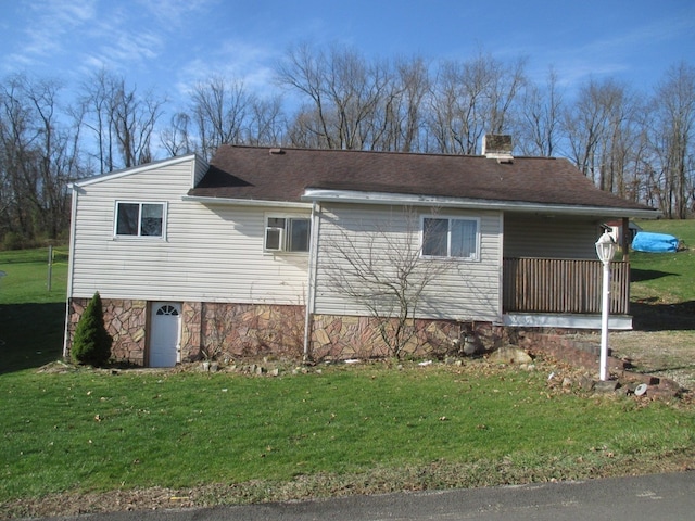 view of front of home with a front yard