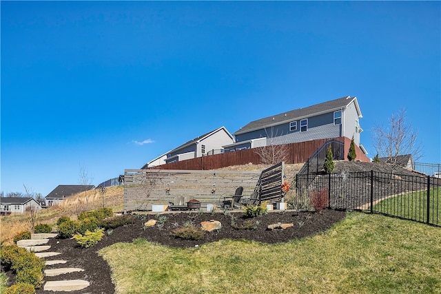 view of home's exterior featuring a yard