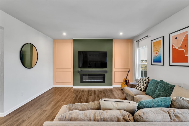 living room with light hardwood / wood-style floors