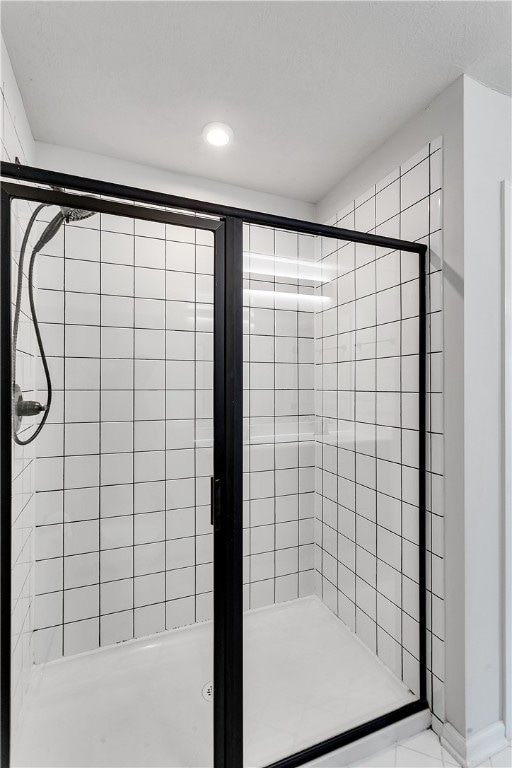 bathroom featuring walk in shower