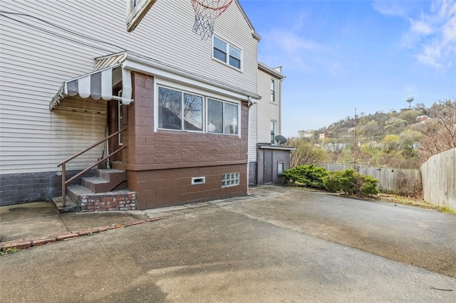 back of property featuring a patio area