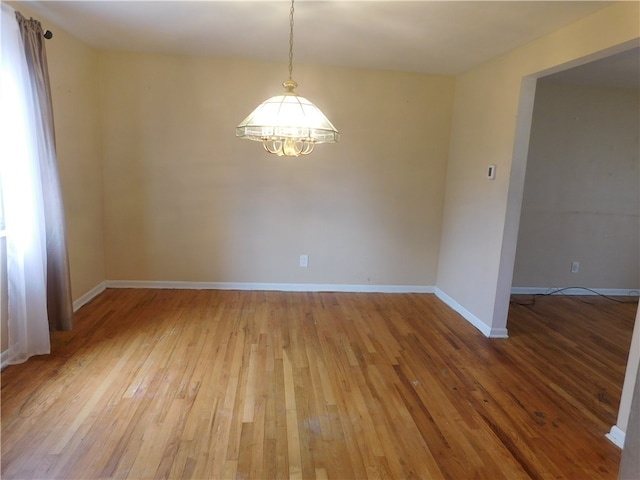 spare room featuring light hardwood / wood-style floors