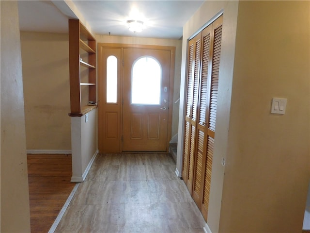 doorway to outside with light hardwood / wood-style floors