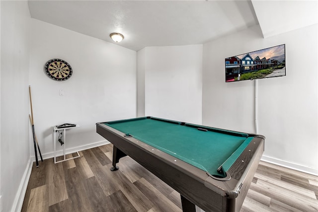 rec room with light hardwood / wood-style floors and billiards