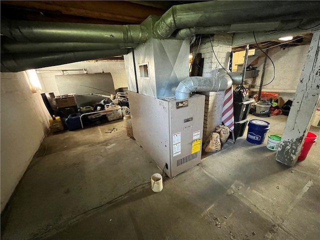 utility room featuring heating utilities