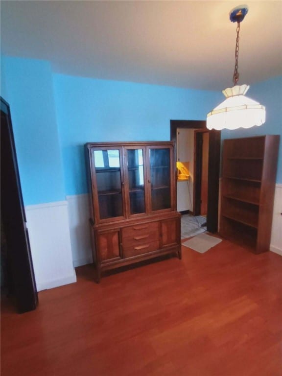 miscellaneous room featuring dark hardwood / wood-style floors