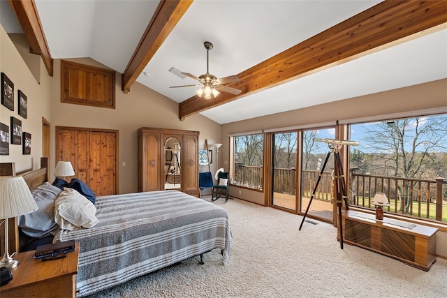 carpeted bedroom featuring access to exterior, ceiling fan, and vaulted ceiling with beams