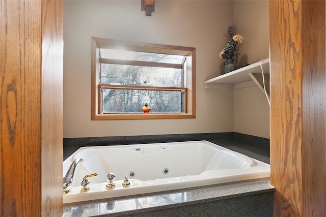 bathroom featuring a bath to relax in