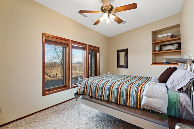 bedroom with ceiling fan and carpet