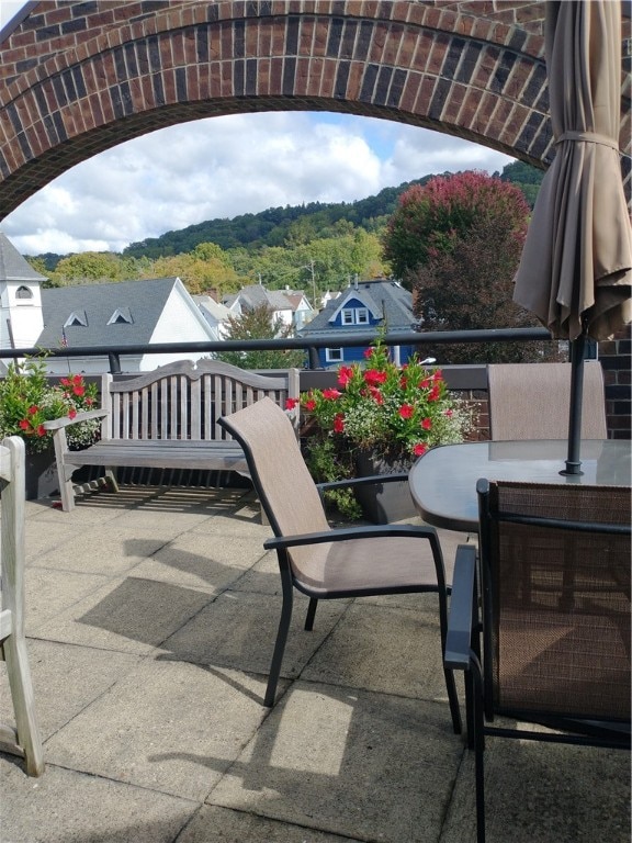 view of patio with a balcony