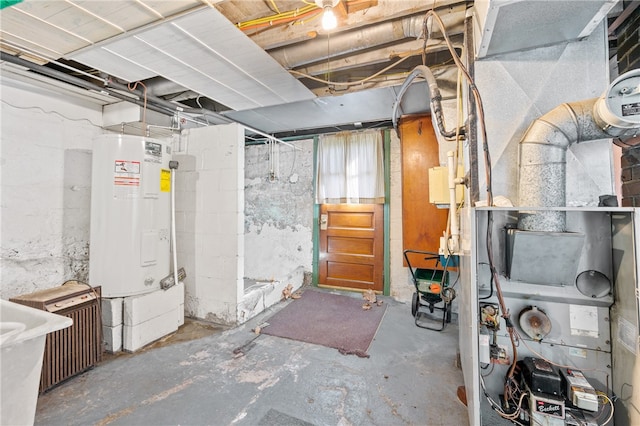 basement featuring electric water heater