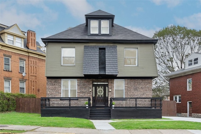 view of front of house with a front lawn