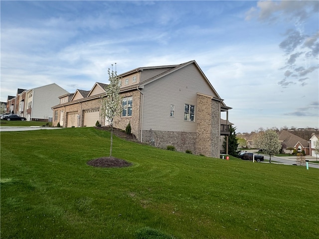 view of home's exterior with a lawn