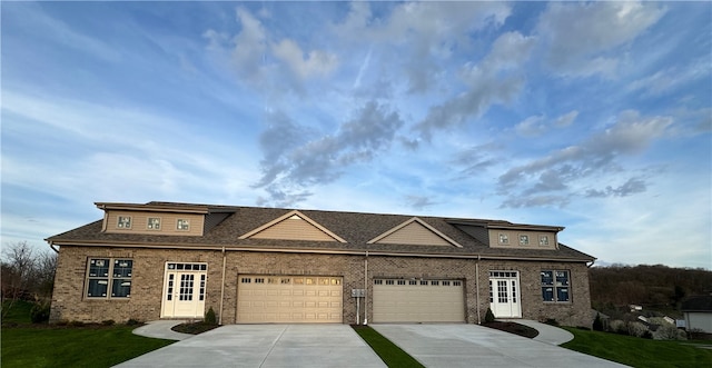 view of front of property with a garage