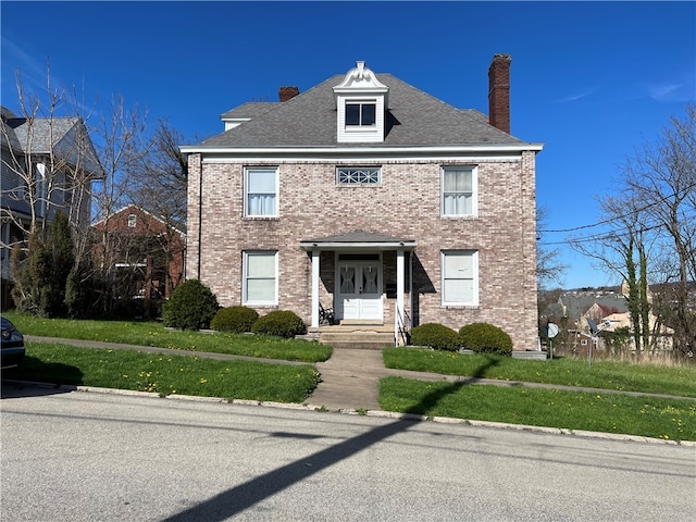 colonial house with a front lawn