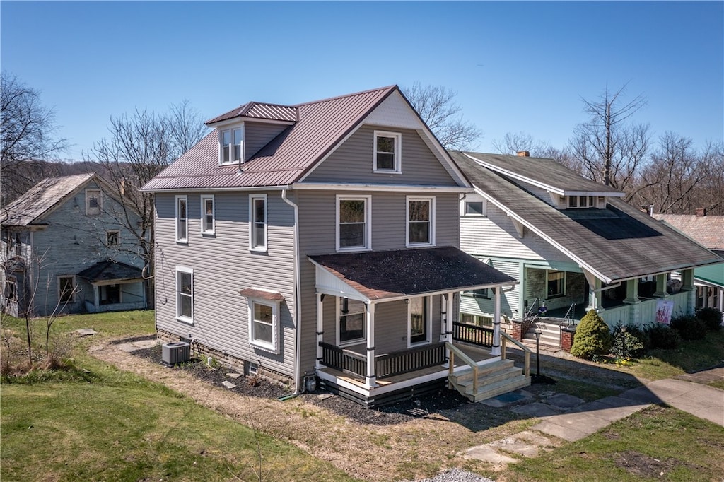 38 Penn Ave, Greenville Boro Mer, PA 16125 - view of front of property with central AC unit, a front lawn, and a porch