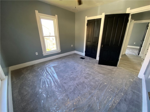 unfurnished bedroom featuring a closet