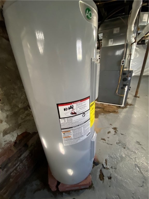 utility room with water heater