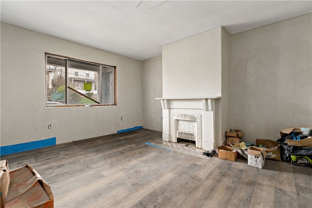 living room with dark hardwood / wood-style flooring